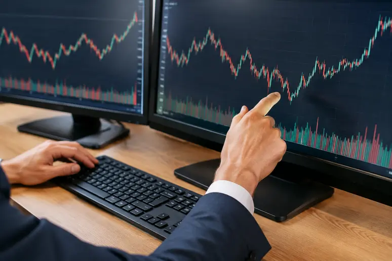 Un investisseur analyse les graphiques et frais de trading sur une plateforme d'échange